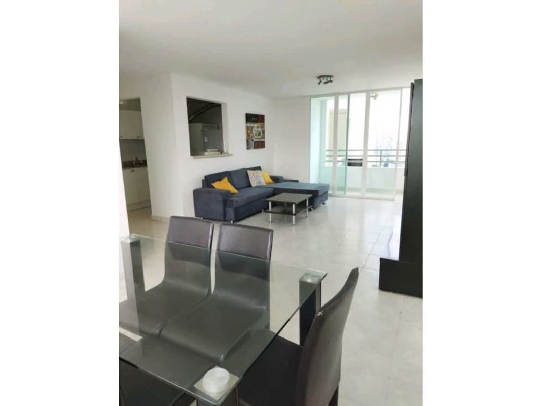 Kitchen with granite counters, refrigerator, microwave, cabinetry PH Edison Park Panama City