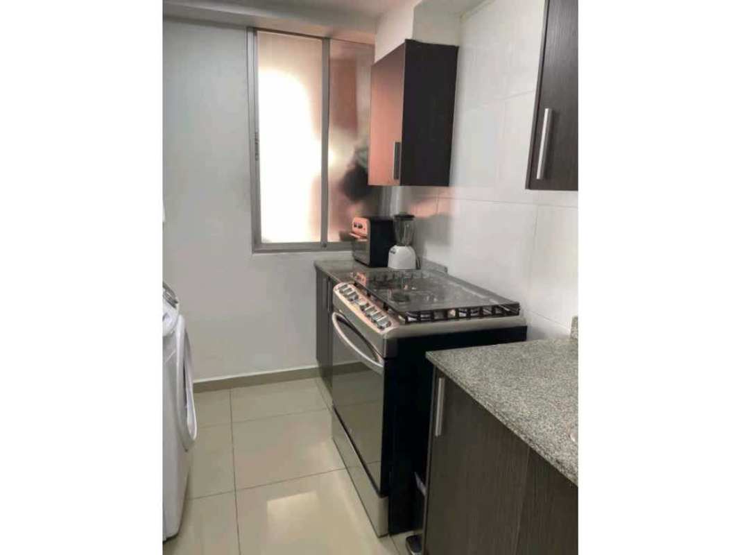 Kitchen with granite tops, LG fridge, Samsung washer dryer, gas stove in PH Park View Carrasquilla Panama City