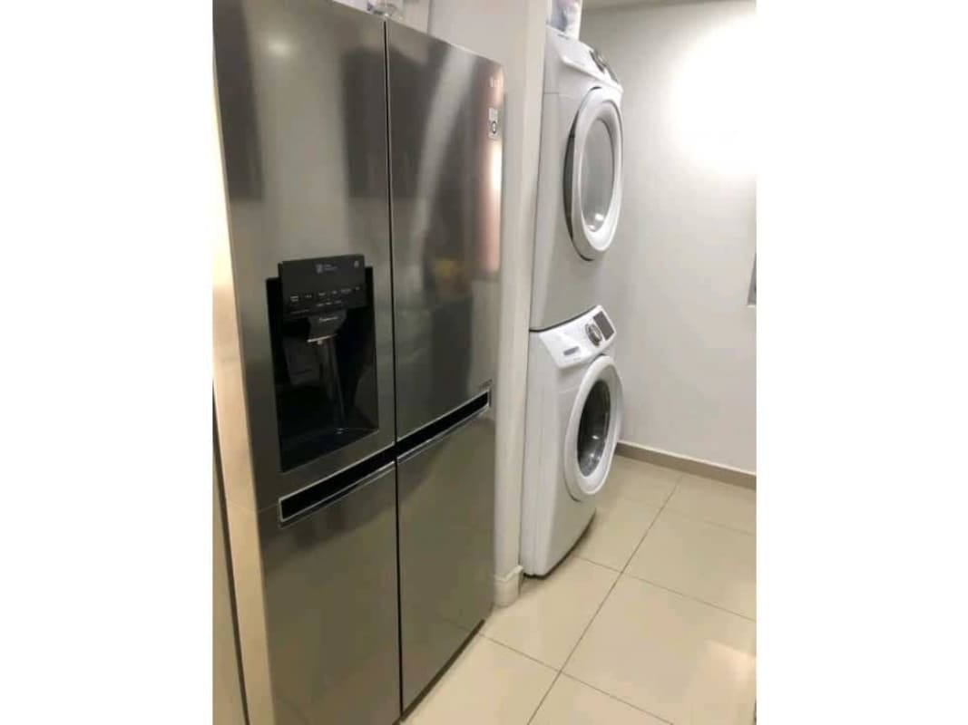 Modern bedroom with custom closet, AC, blackout shades in PH Park View Carrasquilla Panama near Parque Omar