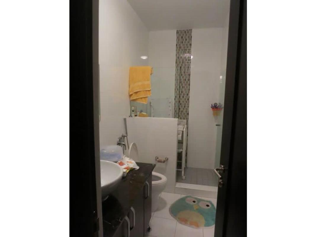 Double vanity bathroom with modern fixtures at PH Q Tower luxury condo Panama City