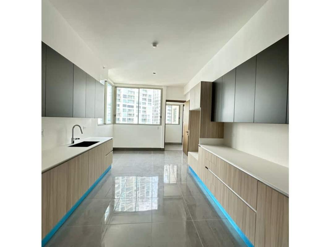Spacious kitchen with built-in cabinets tile floor large windows Pacific Point Tower 400 Panama