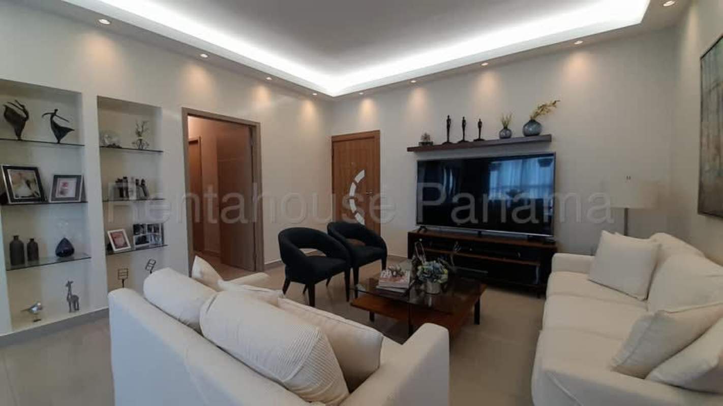 Balcony overlooking ocean and city skyline furnished with seating PH South Coast Panama