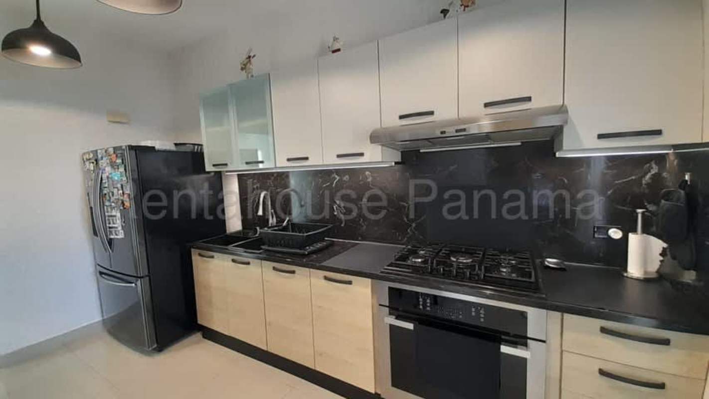 Closed kitchen with granite counters and modern appliances penthouse PH South Coast Panama