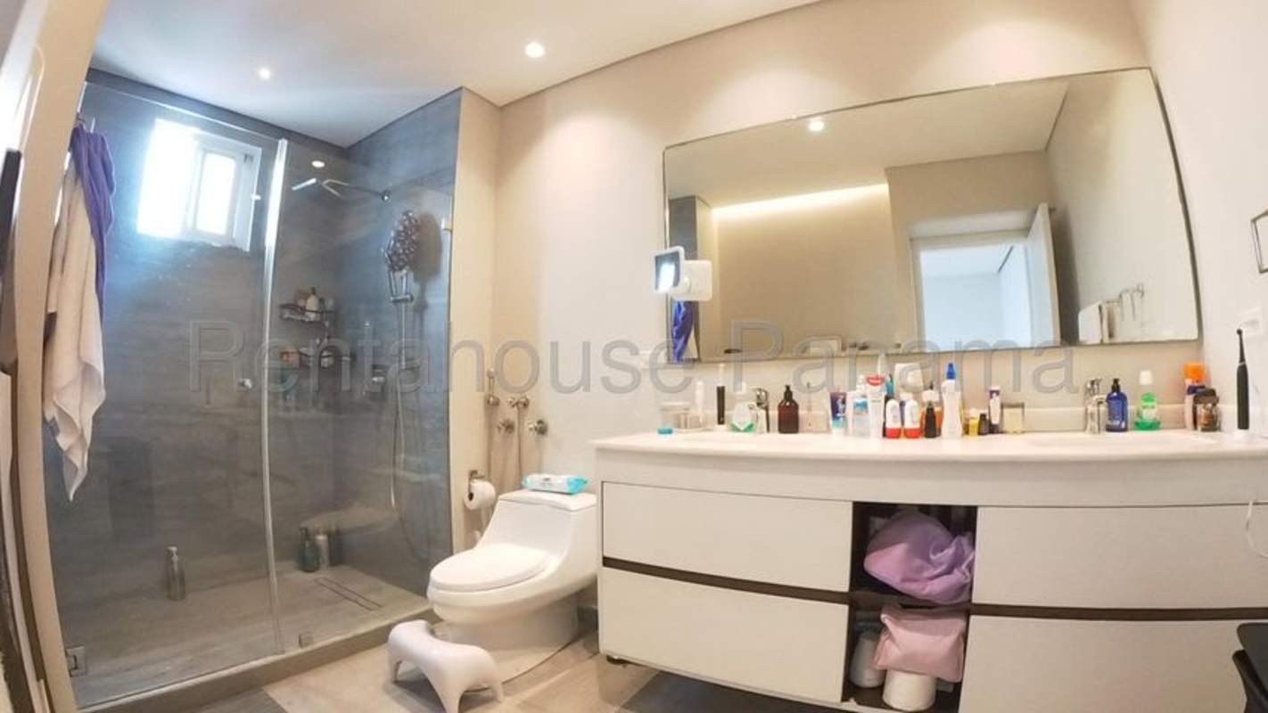 Modern bathroom featuring glass enclosed shower, vanity sink PH Mandarin Bay Panama