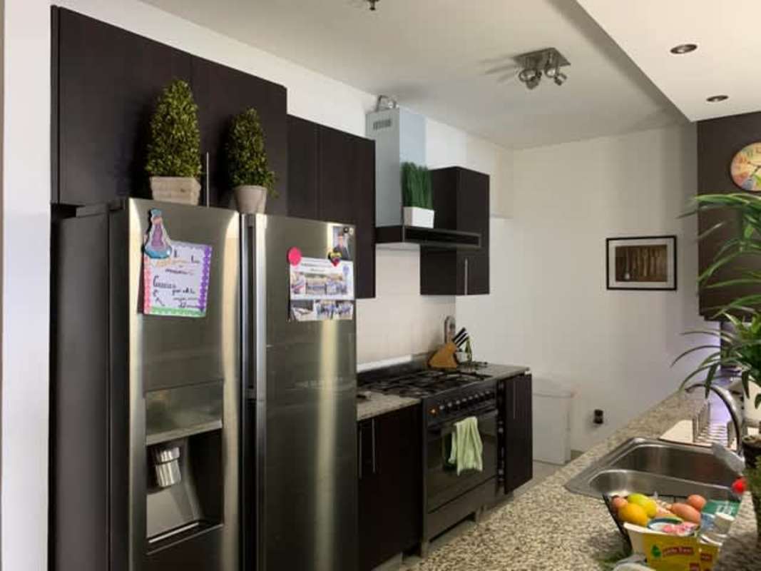 Large swimming pool, sun deck, and social gathering area of PH Premium Tower San Francisco Panama