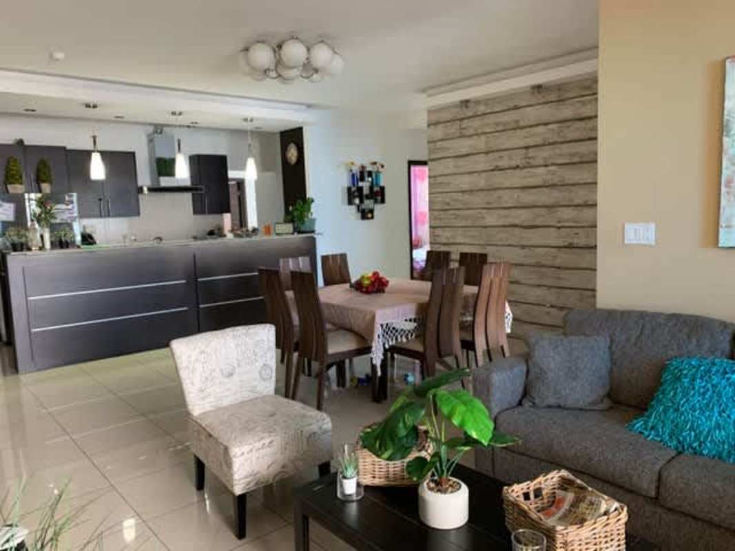 Modern kitchen with granite countertops and stainless steel appliances at PH Premium Tower Panama City