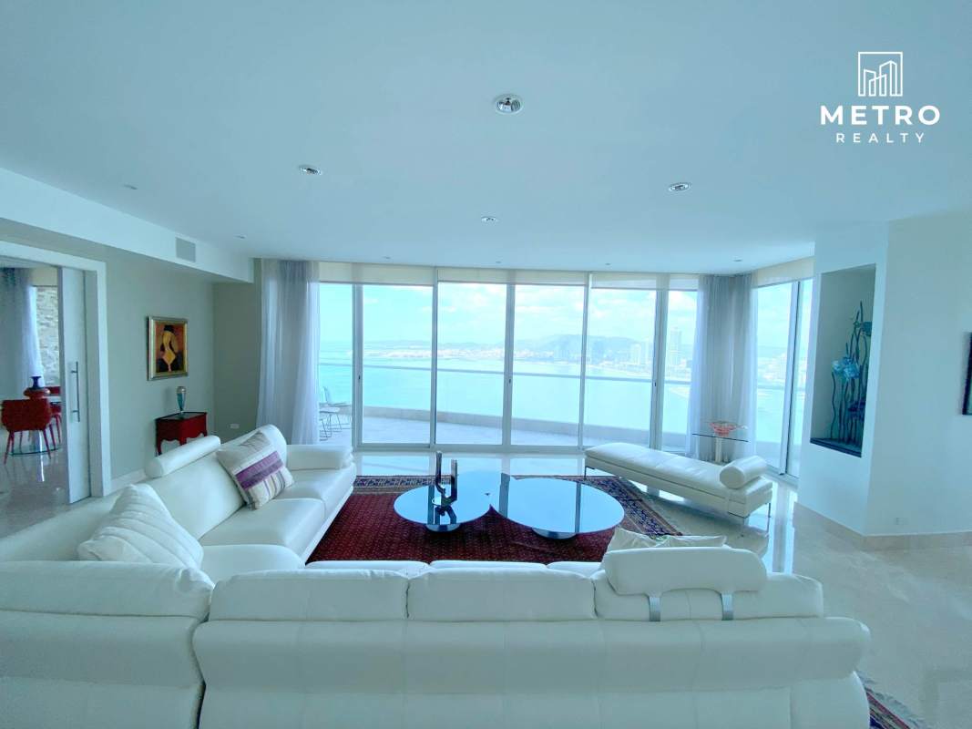 Modern living room with large windows ocean view luxury condo The Point Punta Paitilla Panama