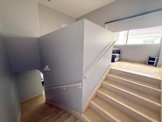 Master suite with balcony facing lake at luxury Buenaventura Ocean Lakes villa Panama