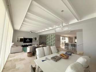 Beautiful private pool and covered patio terrace with lake and garden views in upscale Buenaventura Panama house