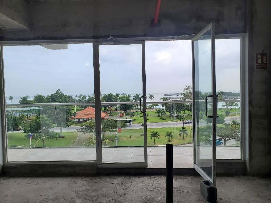 Unfinished commercial locale with concrete walls and visible piping at The Sands Panama