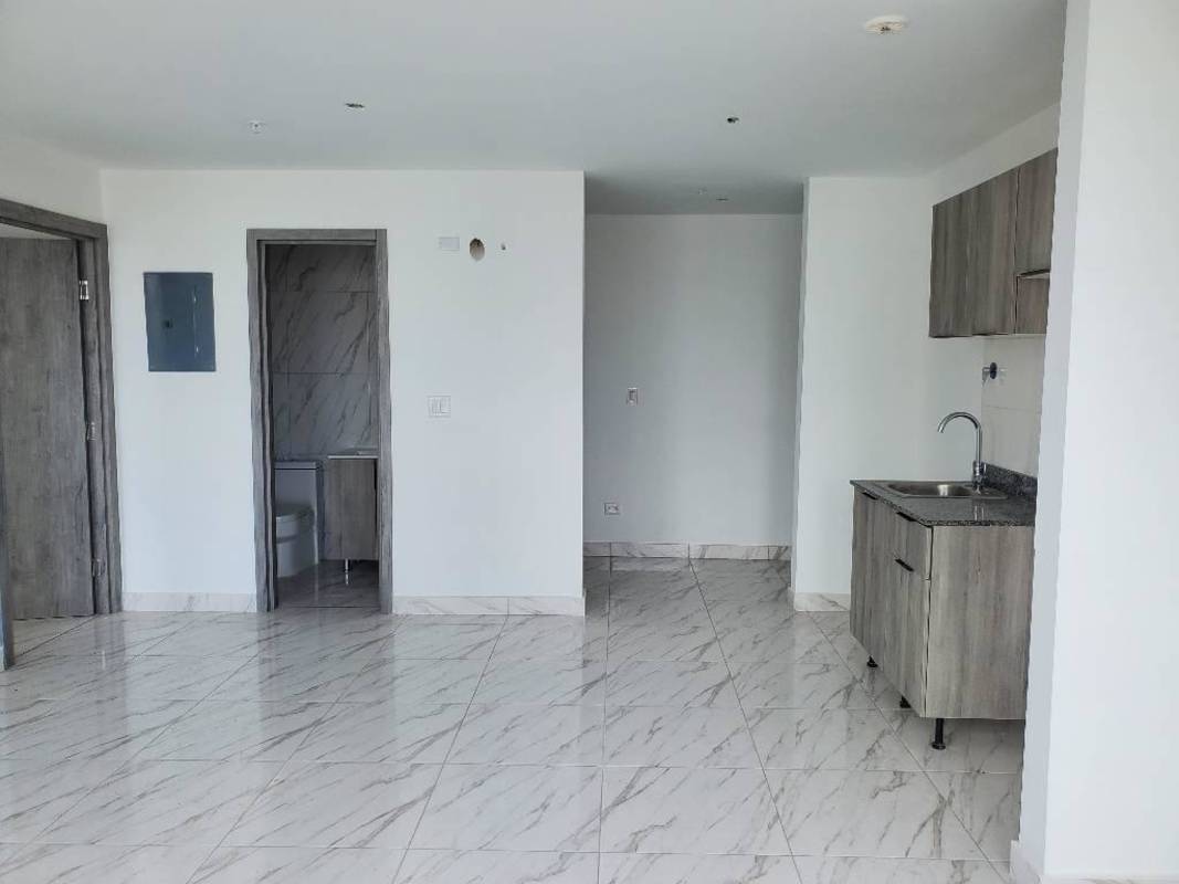 Compact modern kitchen granite countertop and cabinets in PH The Gray apartment Panama