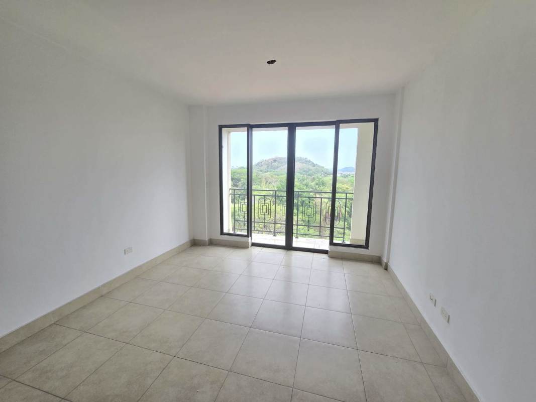 Bathroom with granite vanity, large mirror, tile accents at Amador Heights Panama