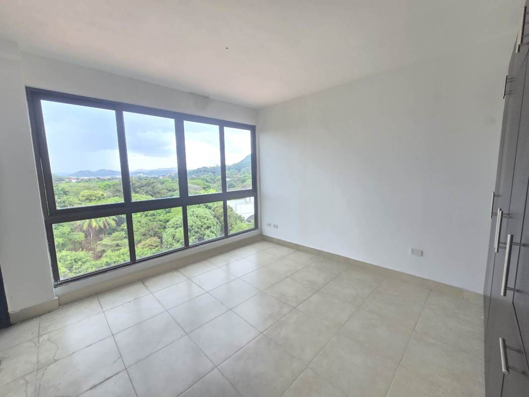 Bright bedroom with canal and mountain views in Amador Heights Panama