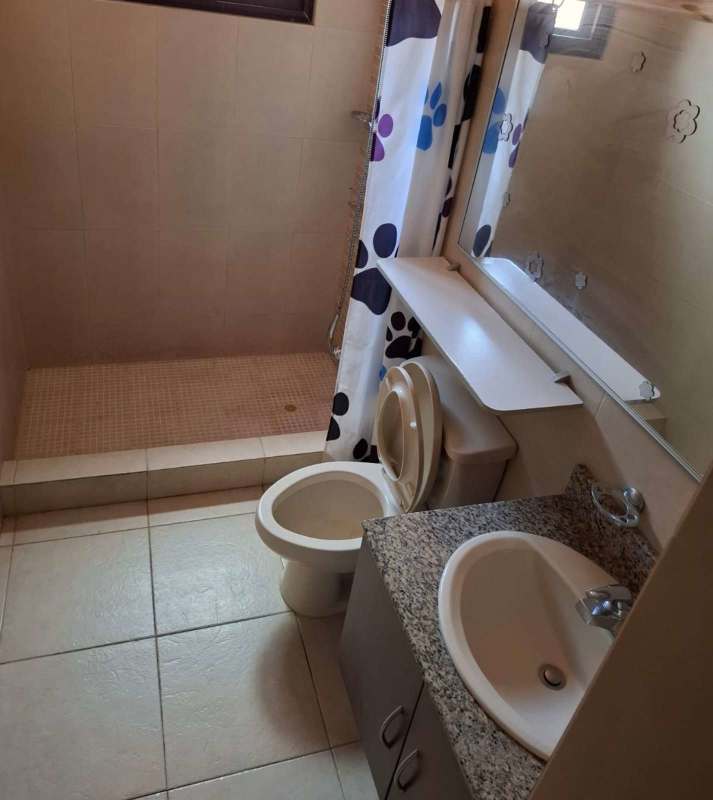 Secondary bedroom with large window and AC in Versalles gated community Panama