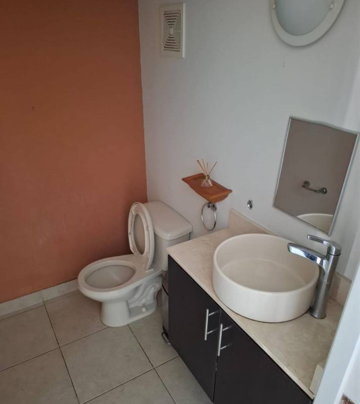 Spacious master bedroom with split AC, balcony access and ensuite in Versalles gated community