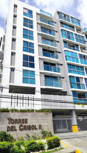 Living room in Torres del Crisol II with large windows and natural light in El Crisol Panama