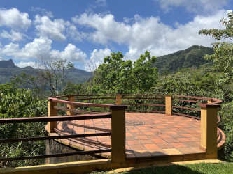 Round terrace with panoramic mountain views at Altos del María house Panama