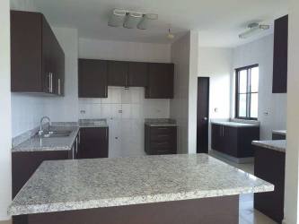 Large living room with sliding doors and abundant light beach house Hacienda Pacifica San Carlos Panama