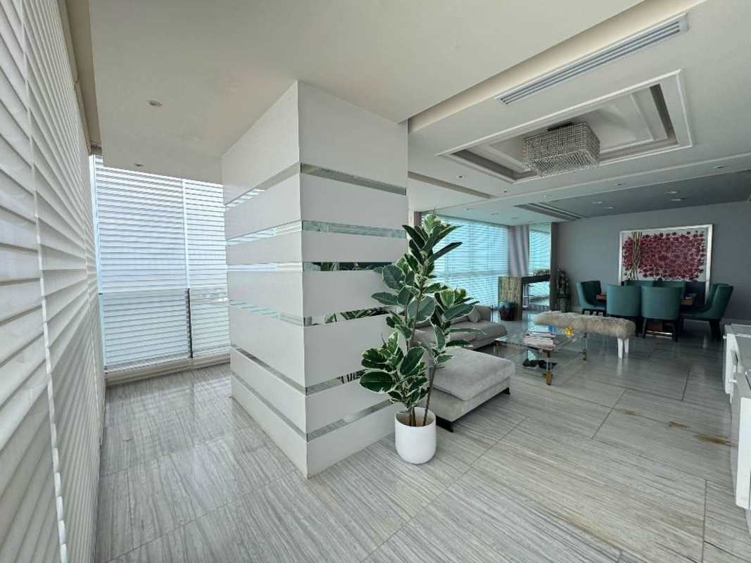 Luxury bathroom with bathtub, marble tiles, glass shower at Trump Ocean Club Panama