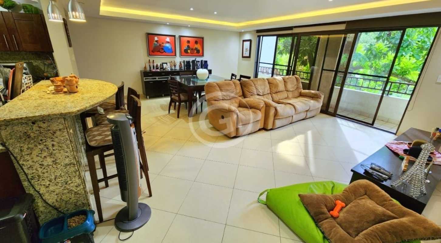 Open kitchen featuring granite countertops, breakfast bar, and natural light Clayton Park Panama