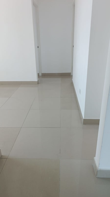 Modern bathroom with glass shower and granite countertop in Costa del Este apartment Panama