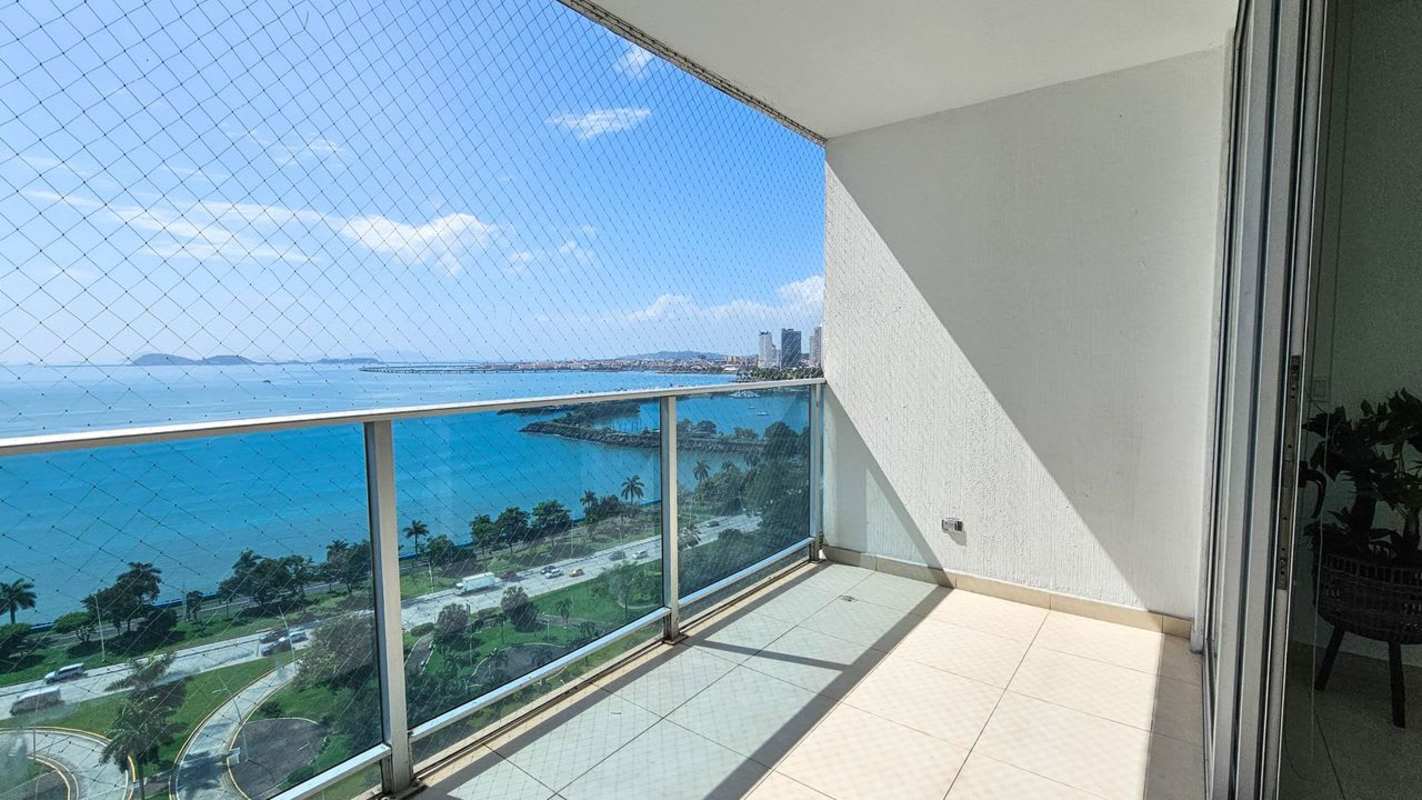 Bathroom with granite vanity and glass shower in PH Waters on the Bay apartment Panama City