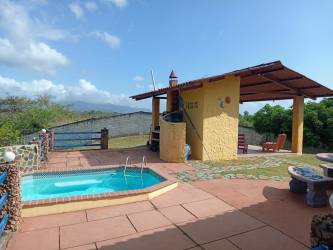 Large fenced grassy backyard with fruit trees countryside home Panama