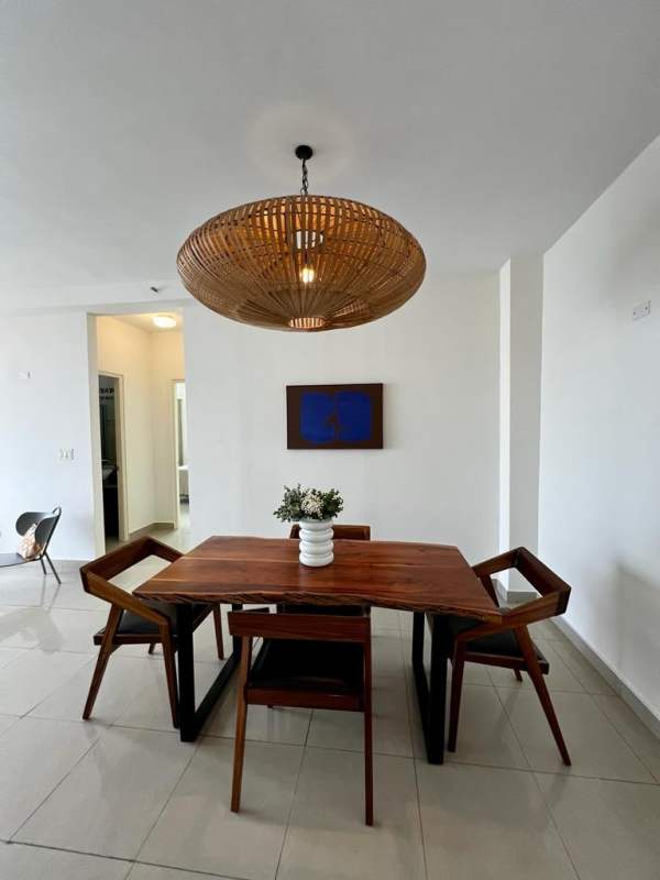 Bright living dining furnished space with access to balcony in PH Club de Golf San Francisco Panama