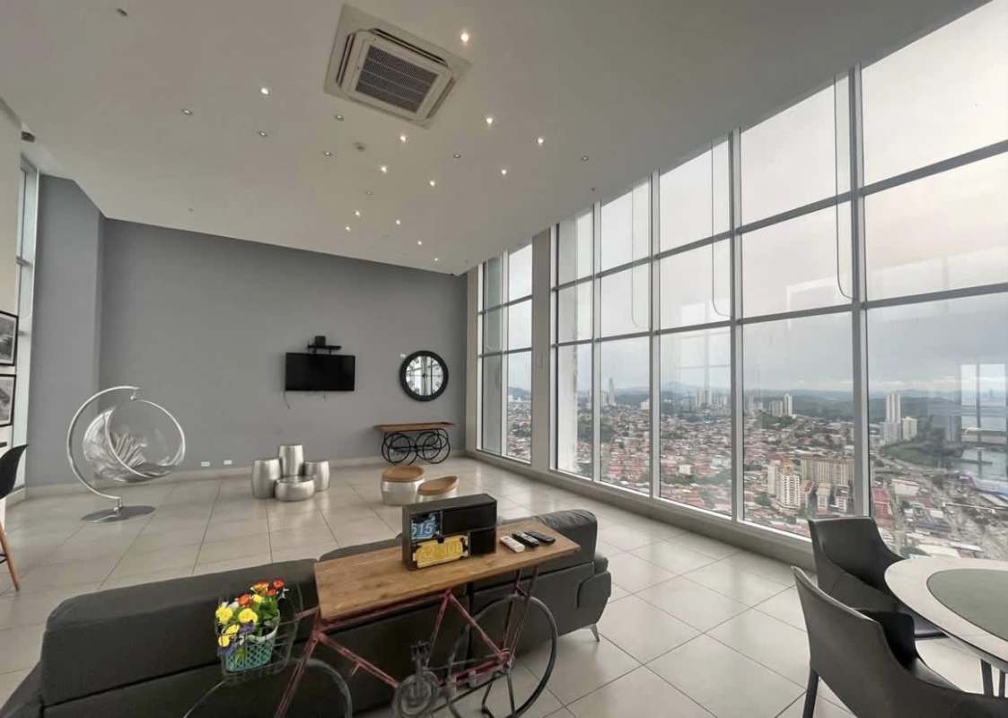 Open living dining space with city skyline views apartment for rent PH Sky Point Panama City
