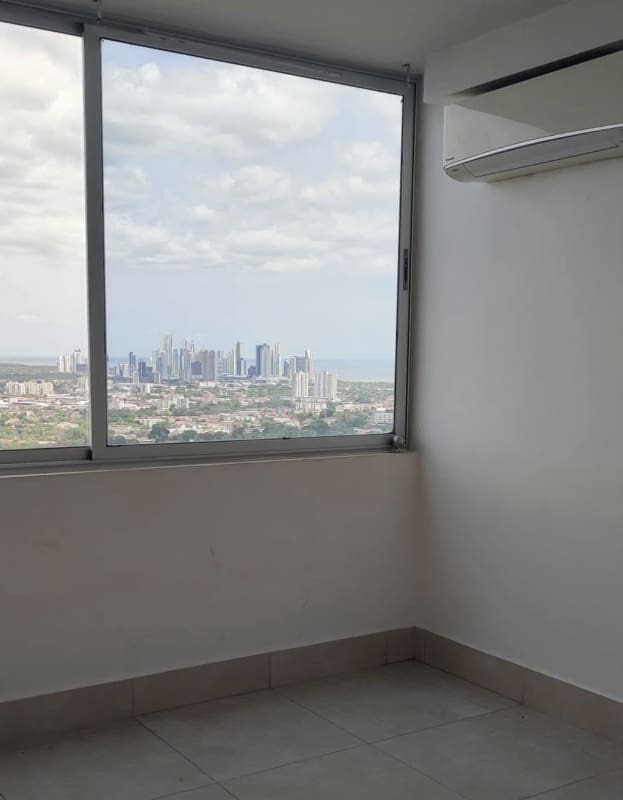 Unfurnished bedroom with panoramic skyline views PH Sky Point Panama City apartment