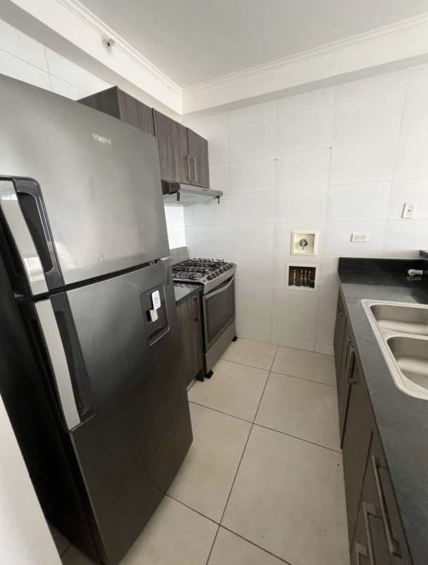 Modern kitchen with granite counter and stainless appliances PH Sky Point Panama City