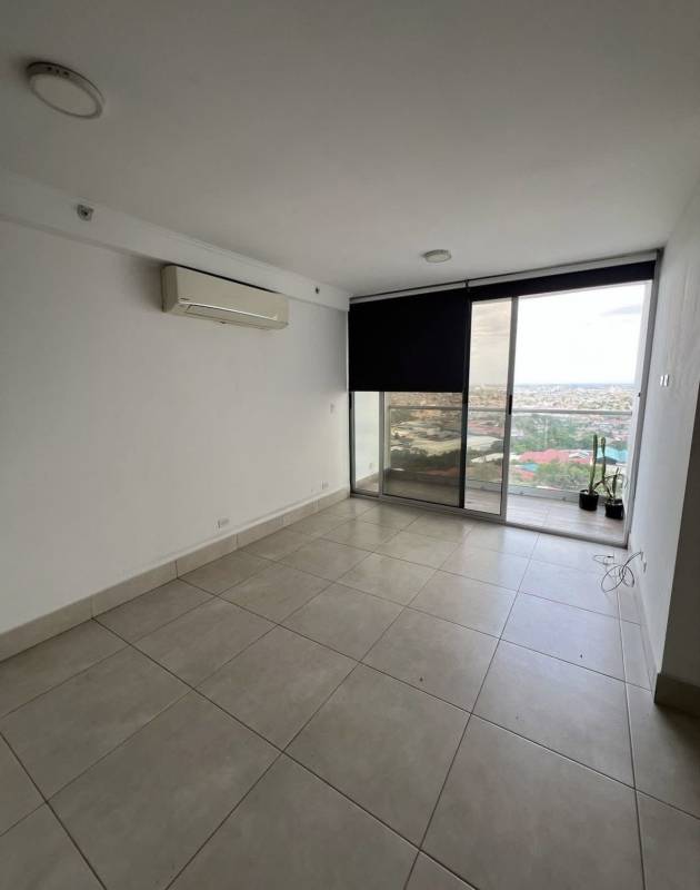 Unfurnished living room with balcony view for rent in PH Sky Point Tumba Muerto Panama City
