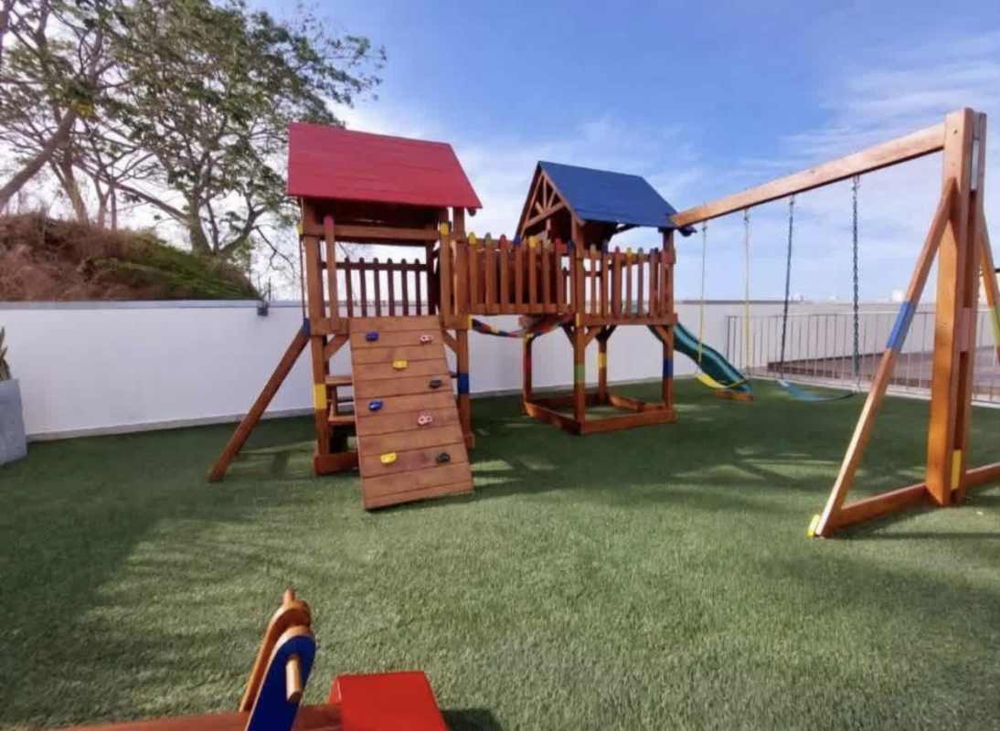 Outdoor children's playground with slides and swings PH Sky Point Panama City