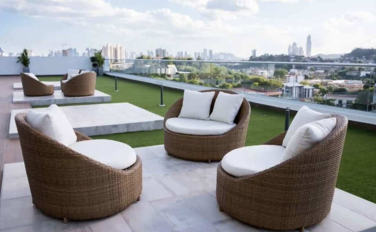 Rooftop terrace with lounge seating and city skyline views PH Sky Point Panama