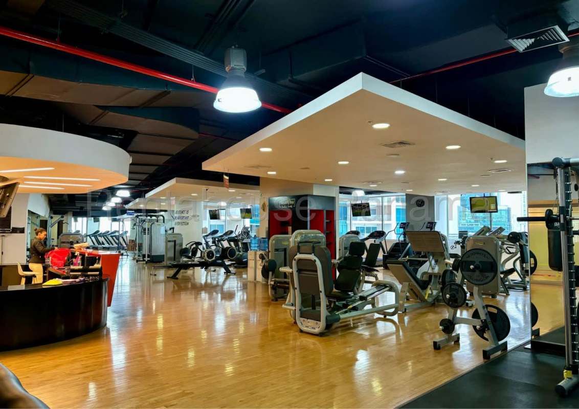 Modern gym with city skyline and ocean views at JW Marriott Punta Pacifica Panama