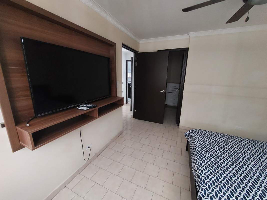 Bathroom with glass shower, dual sinks, tile walls PH Coral Plaza Marbella Panama