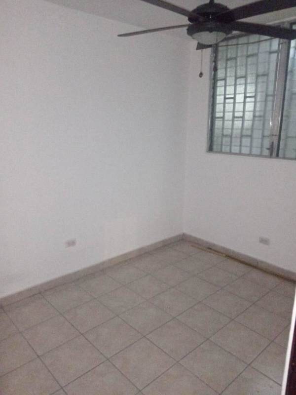 Empty second bedroom with window and tiled floors in apartment for rent near Costa del Este Panama