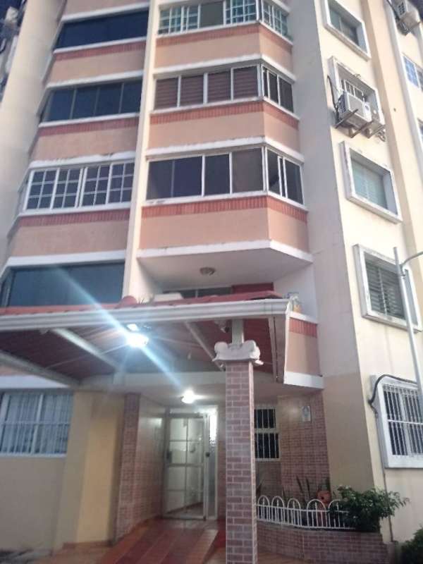 Open layout living area with tiled floors and adjacent laundry zone near Costa del Este Panama City