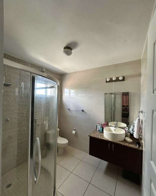 Contemporary bathroom with floating vanity, vessel sink, glass shower in PH Augusta Brisas del Golf
