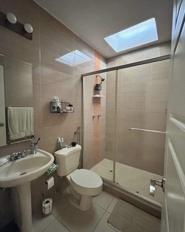 Bright stairwell with natural light, metal railing, modern windows in PH Augusta Brisas del Golf Panama City