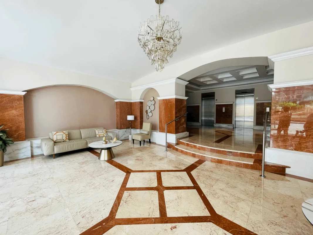 Traditional kitchen granite counters, wood cabinets, modern appliances, Punta Pacifica Panama