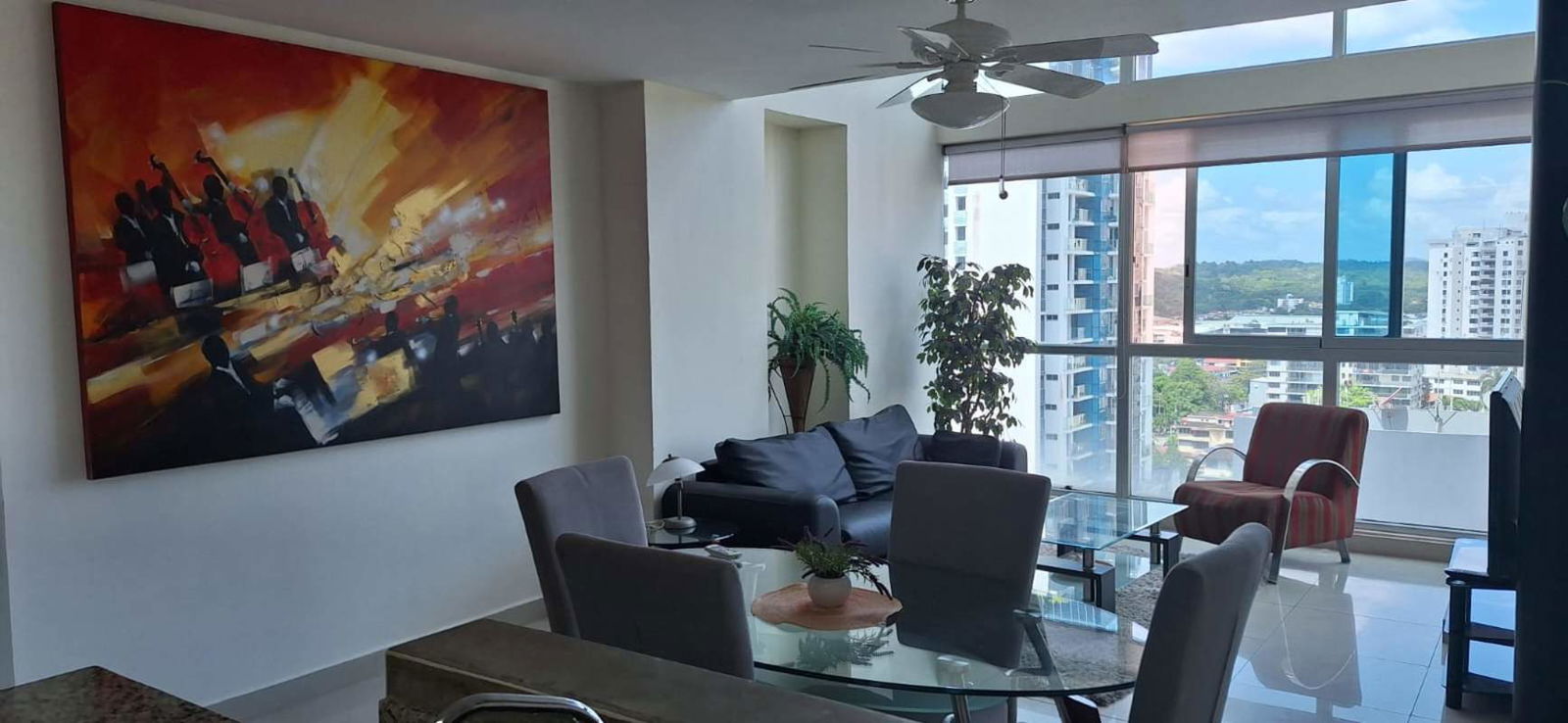 Well-appointed bathroom with glass shower enclosure granite vanity PH Vitro Loft Panama