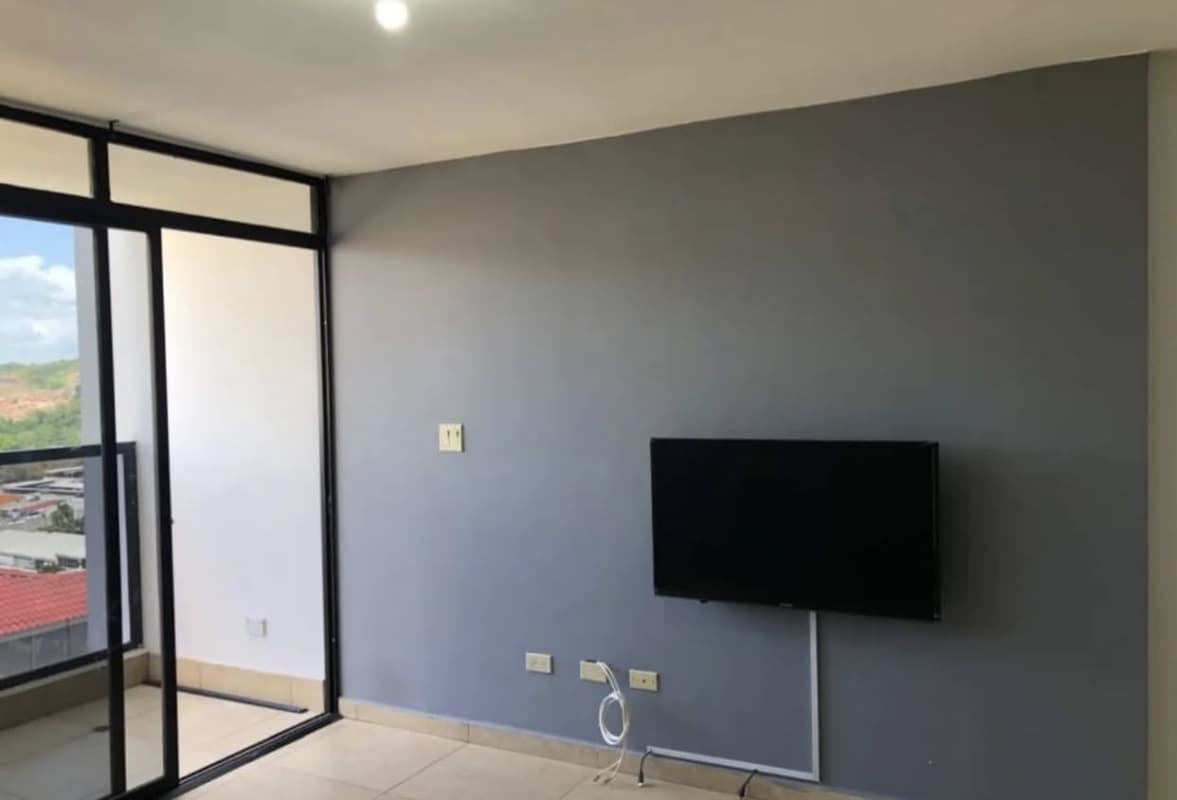 Modern kitchen with granite countertops and wooden cabinets, PH Terrazas del Rey Panama