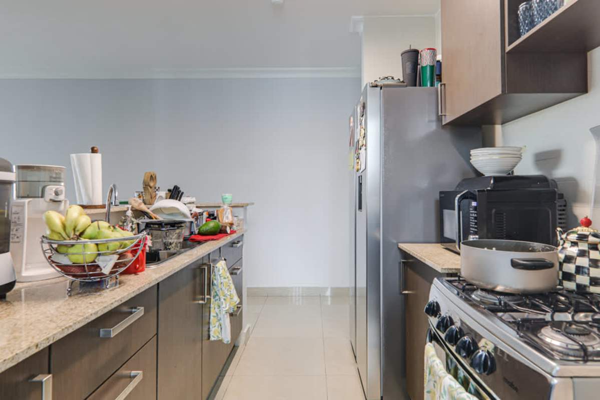 Living space with modern divider, city skyline view PH Pacific Sun Panama