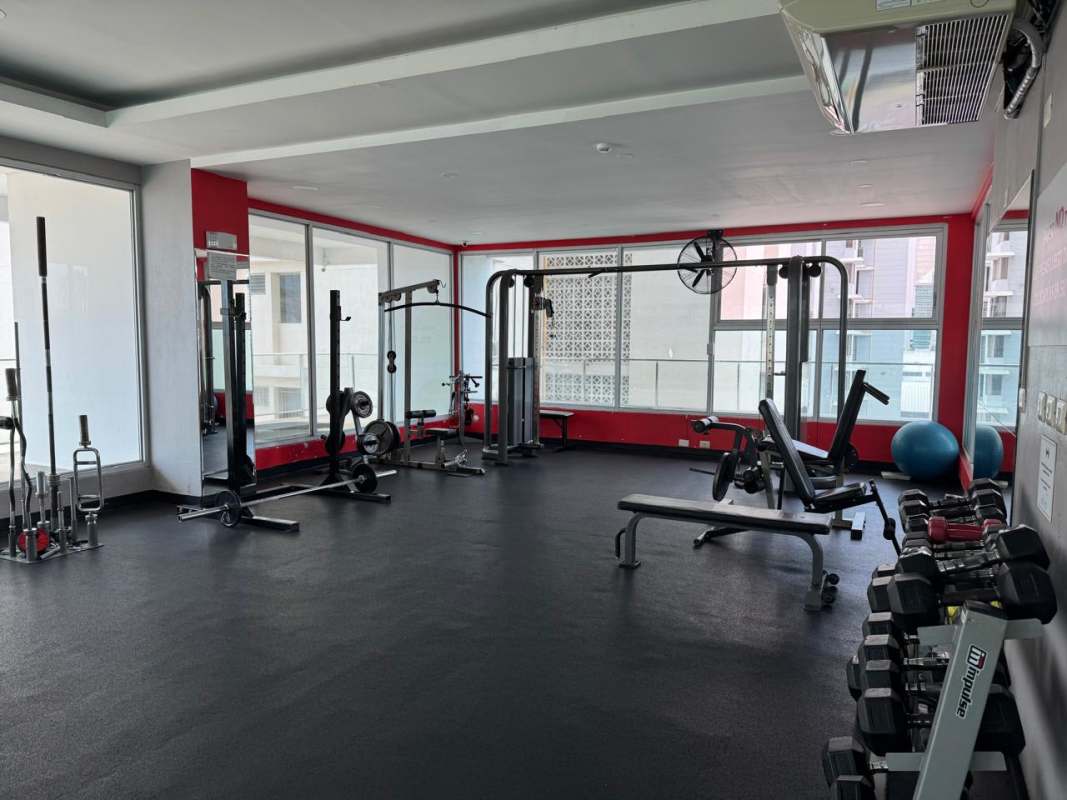 Full gym with cardio and weight equipment in PH Pacific Sun Panama