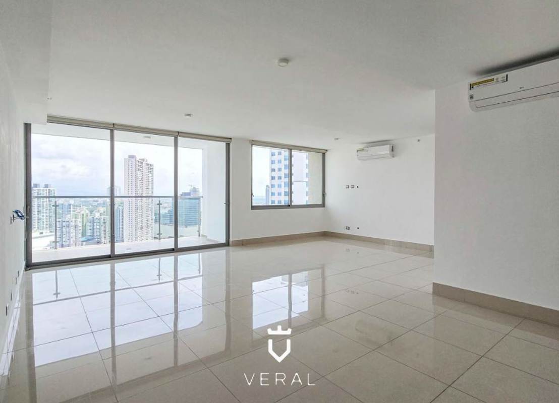 Bright living room with marble floors, balcony access and ocean views PH Bali Costa del Este Panama City