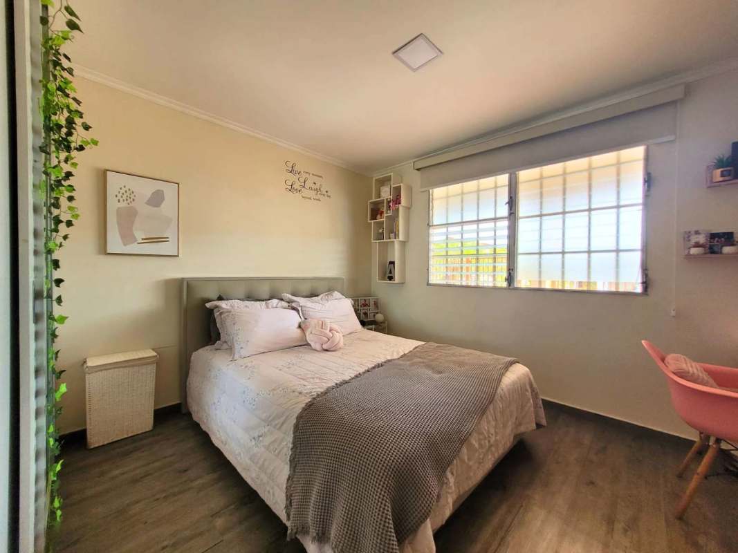 Swimming pool with deck and garden in Brisas del Golf home