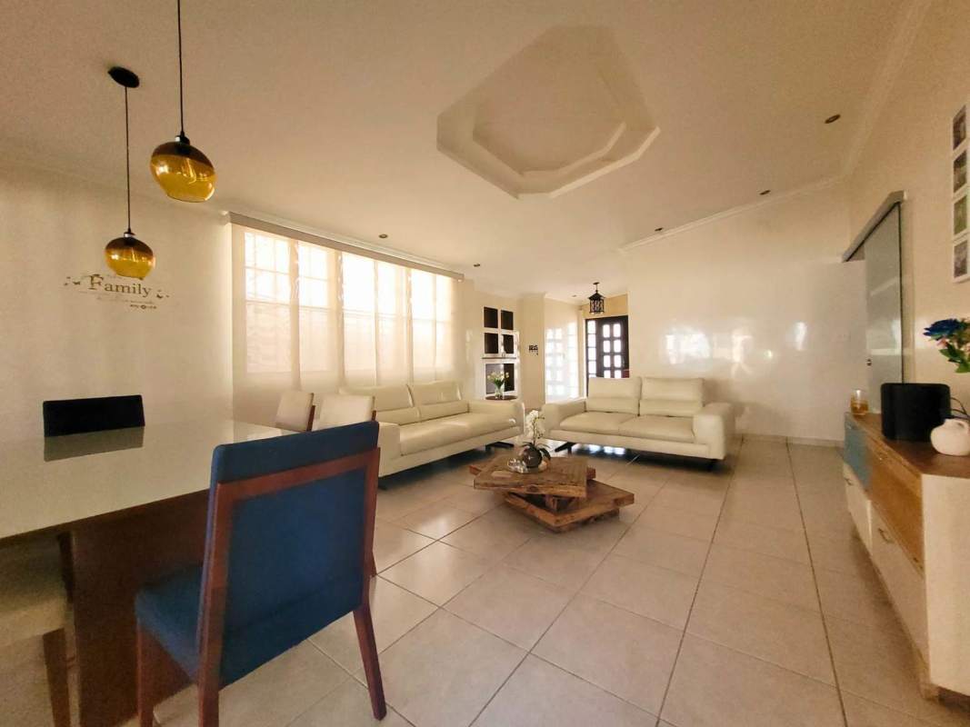 Modern living room with white sofas bright space Brisas del Golf home Panama