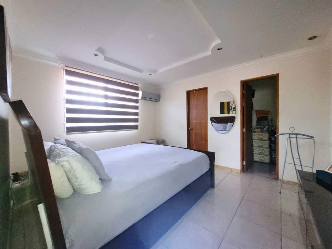 Terrace patio area with pool lush plants Brisas del Golf Panama home