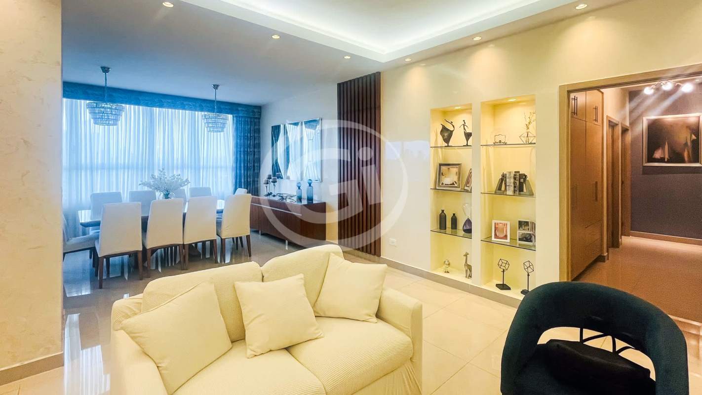 Modern kitchen with black marble backsplash, wood cabinets and appliances at PH South Coast San Francisco Panama